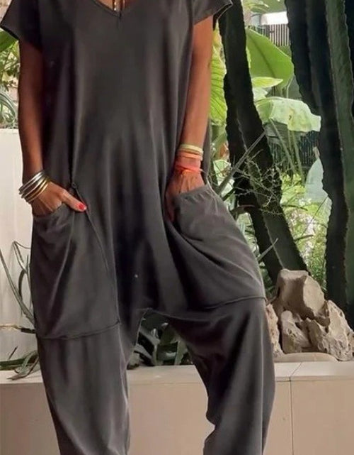 Load image into Gallery viewer, European And American Solid Color And V-neck Oversized Pocket Low-grade Jumpsuit
